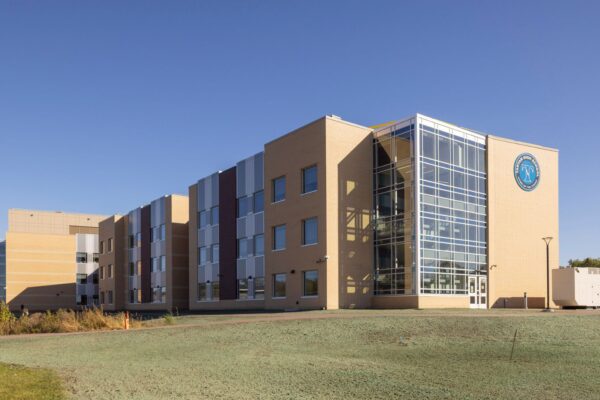 Rather than replacing the school, the district pursued an addition and renovation strategy that kept the campus operating on its existing site, reducing both cost and waste.