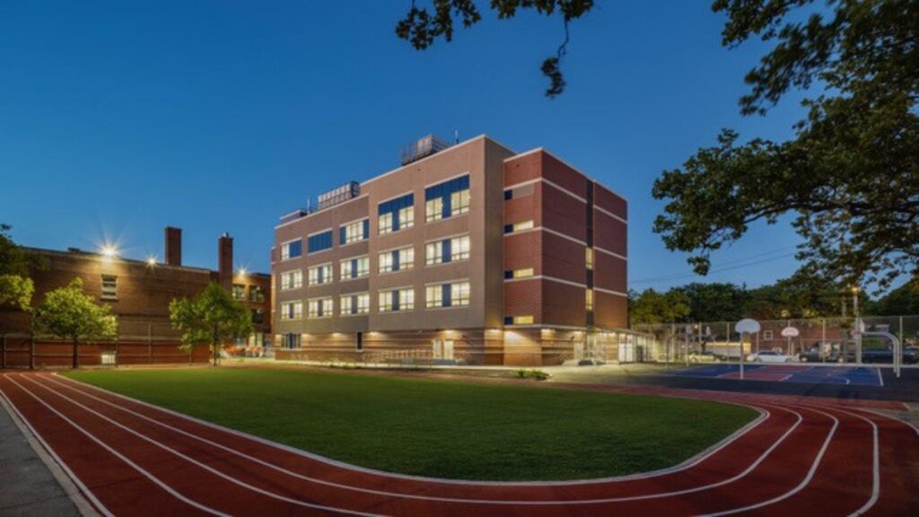 Delivering a major addition on a fully occupied elementary school site in a dense residential neighborhood required precise phasing and operational coordination.