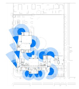 Optimized camera positions and resulting view fields applied to a specific school site.