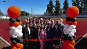 School leaders and project partners gather for the official ribbon-cutting ceremony of the new Upper Athletic Fields at Beverly Hills High School.