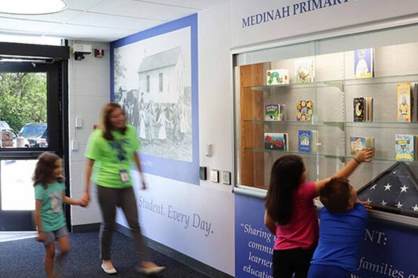 Using Medinah Primary School in Illinois as an example, Legat notes that campus safety begins outside the building through features such as separate bus loops, dedicated parent drop-off areas, and protected pedestrian walkways that reduce contact between vehicles and students.