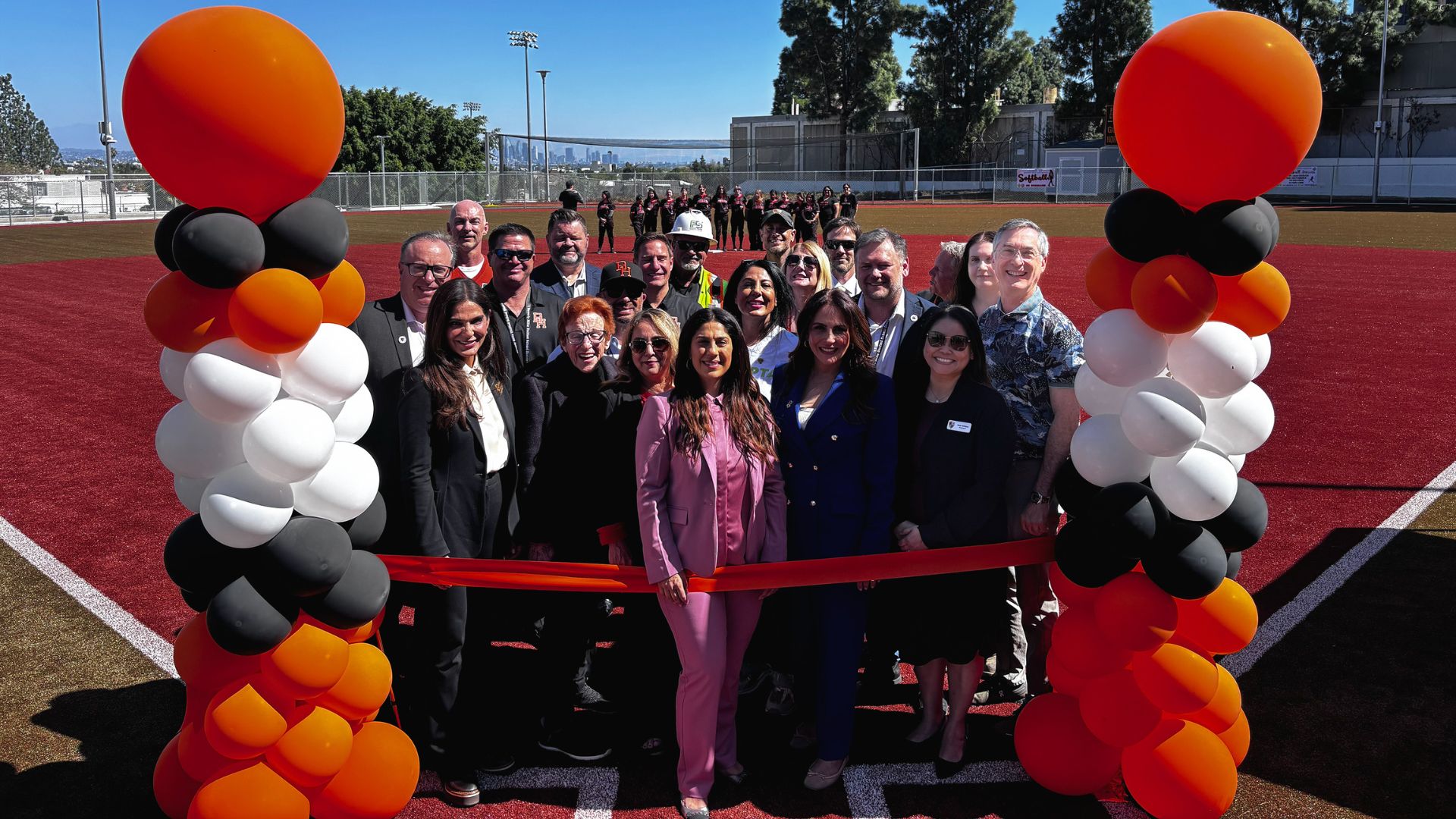 School leaders and project partners gather for the official ribbon-cutting ceremony of the new Upper Athletic Fields at Beverly Hills High School.