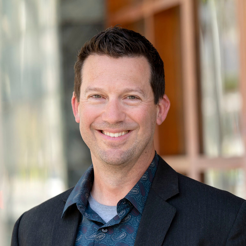 headshot photos of Joel Williams